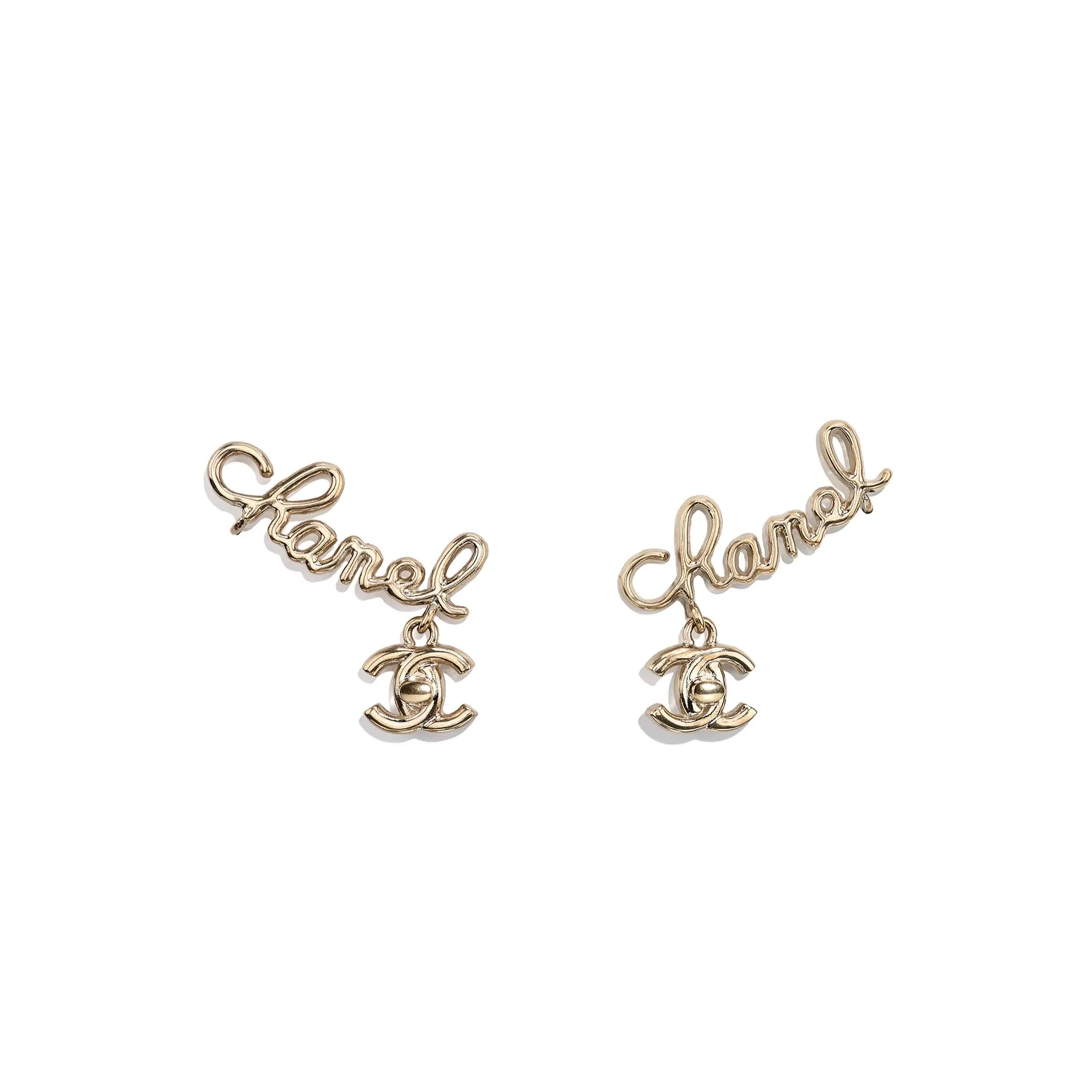 Ch**el cc logo cursive signature gold tone ear crawler cuff clip earrings